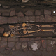 The grim burial scene.